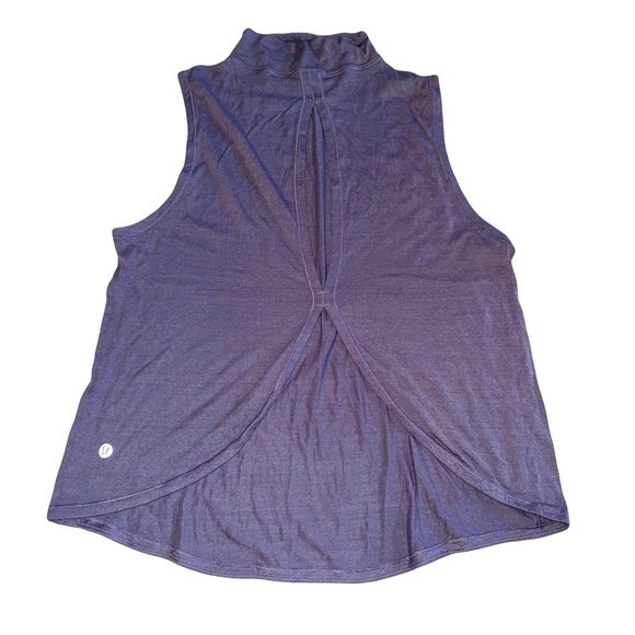 Lululemon Twist & Reach Mock Neck Tank
Heathered Aeon Fits Like 6/8 Med - Picture 2 of 8